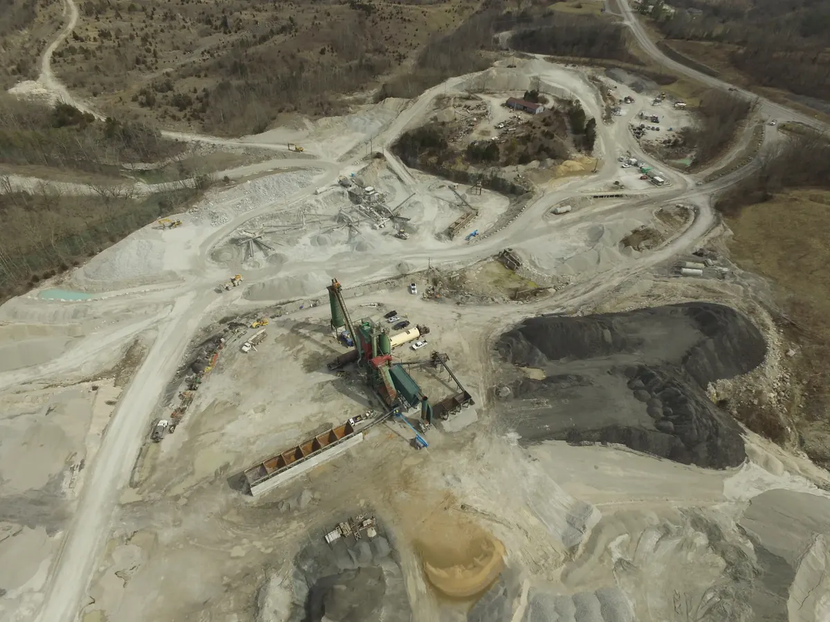 Limestone aggregate stockpiles at a Mountain quarry